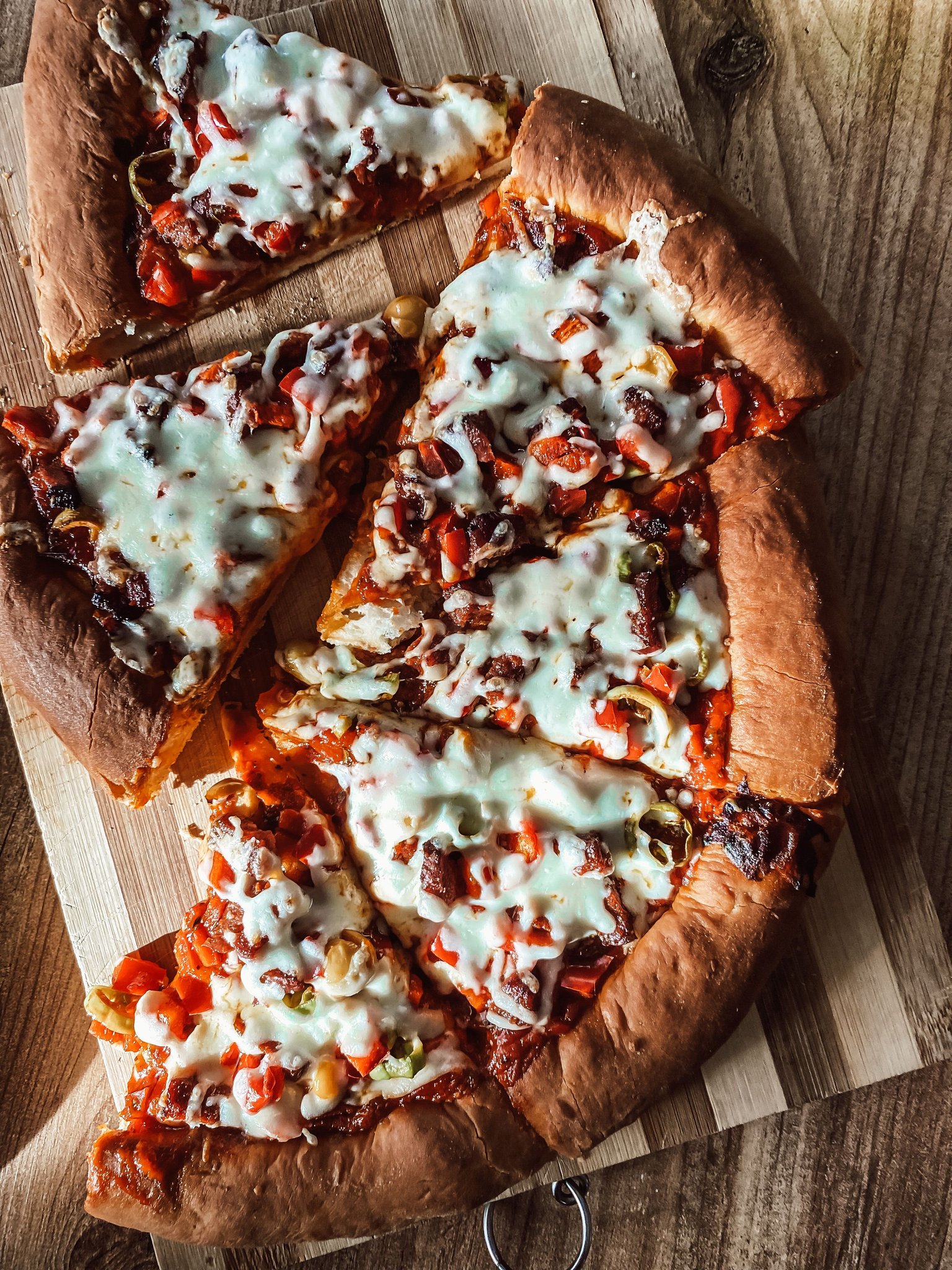 Pizza slices on a wooden board, 8 slices
