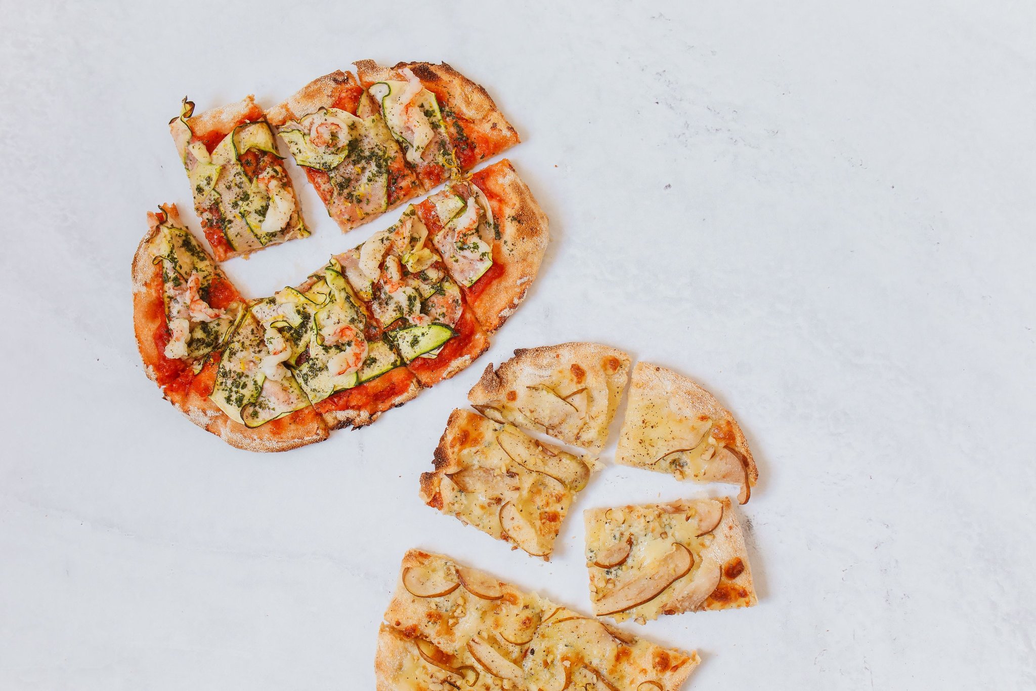 Top-view of sliced artisan pizza, 8 slices